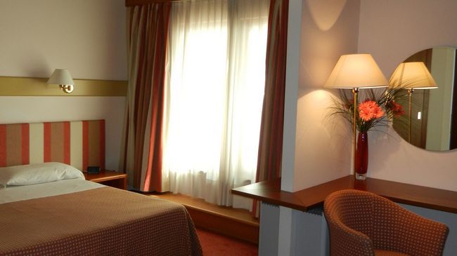 Eurohotel Palace Maniago Quarto foto
